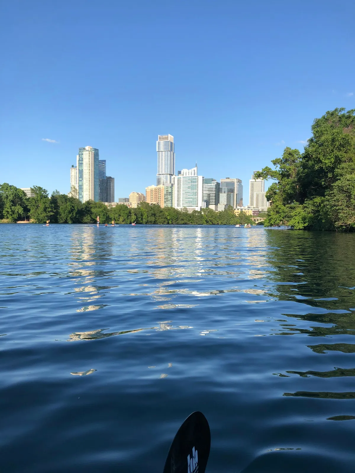 Austin skyline seen from a kayak on Lady Bird Lake