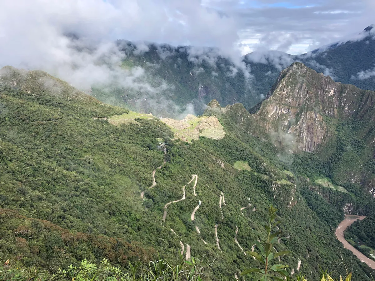 First view of Machu Picchu with switchbacks below